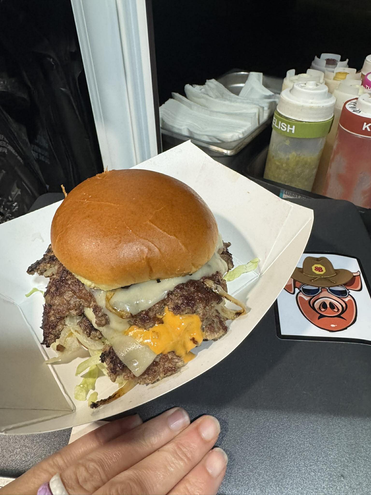 Double smash burger with melted cheese and crispy edges